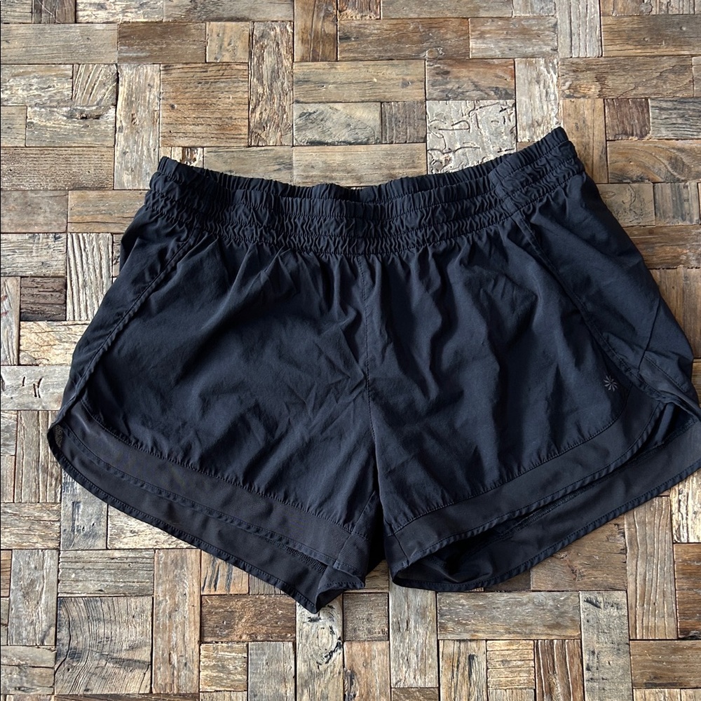 Athleta Black Mesh Racer Run 4” size Large